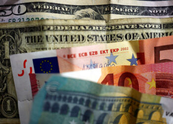 Dollar gains on tariffs fears; euro looks to ECB meeting